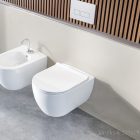 CeraStyle CITY fehér perem nélküli mély öblítésű íves fali WC, tetővel